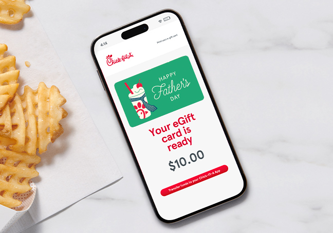  Smartphone showing a "Happy Father's Day" e-gift card next to a side of Waffle Fries